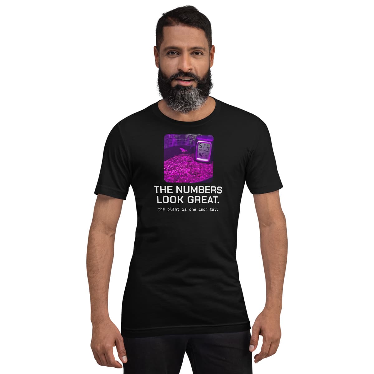 The Numbers Look Great tee, Black, worn by a model. A mockup from the printer.